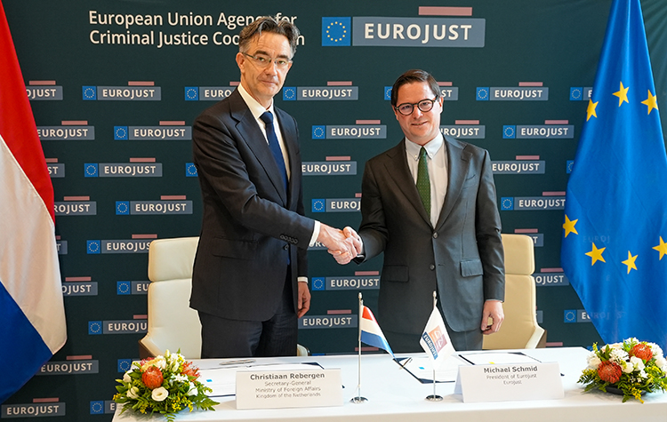 Shaking hands after signing of seat agreement