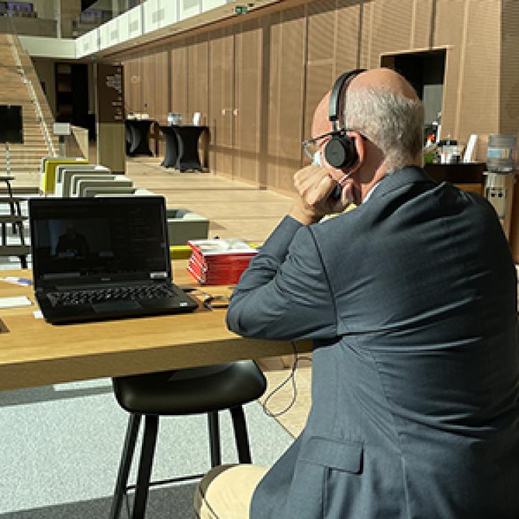 Administrative Director listening to presentations open day