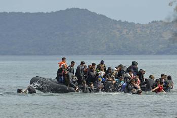 Group of people on a dinghy (Photo © Shutterstock)