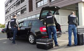 Gendarmerie Nationale officers in front of a car