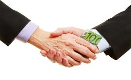 bribe: hands shaking, money exchanged