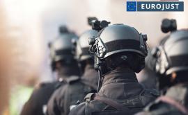 Picture of soldiers with overlay in top-right Eurojust logo
