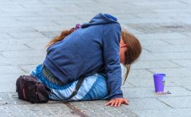 Girl begging on street