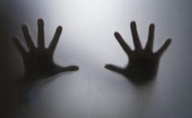 Hands on glass
