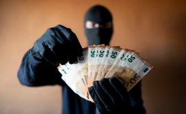 Robber showing  off money